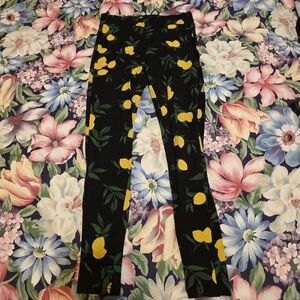 Torrid Black Leggings with Yellow Lemons Pattern.
